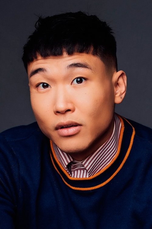 Joel Kim Booster jako Variety Show Host 1 / Idol Host / Romance Saja (voice) w obsadzie K-popowe łowczynie demonów
